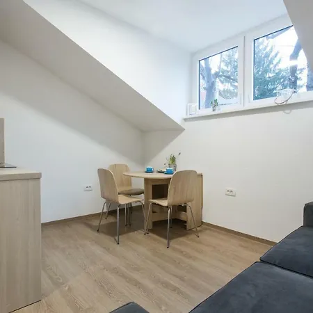 District Apartment *