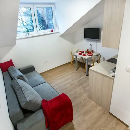 District Apartment *